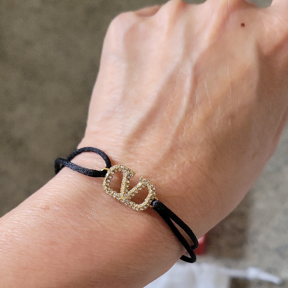 Valentino Garavani Black and Gold Bracelet Minimalist Design
